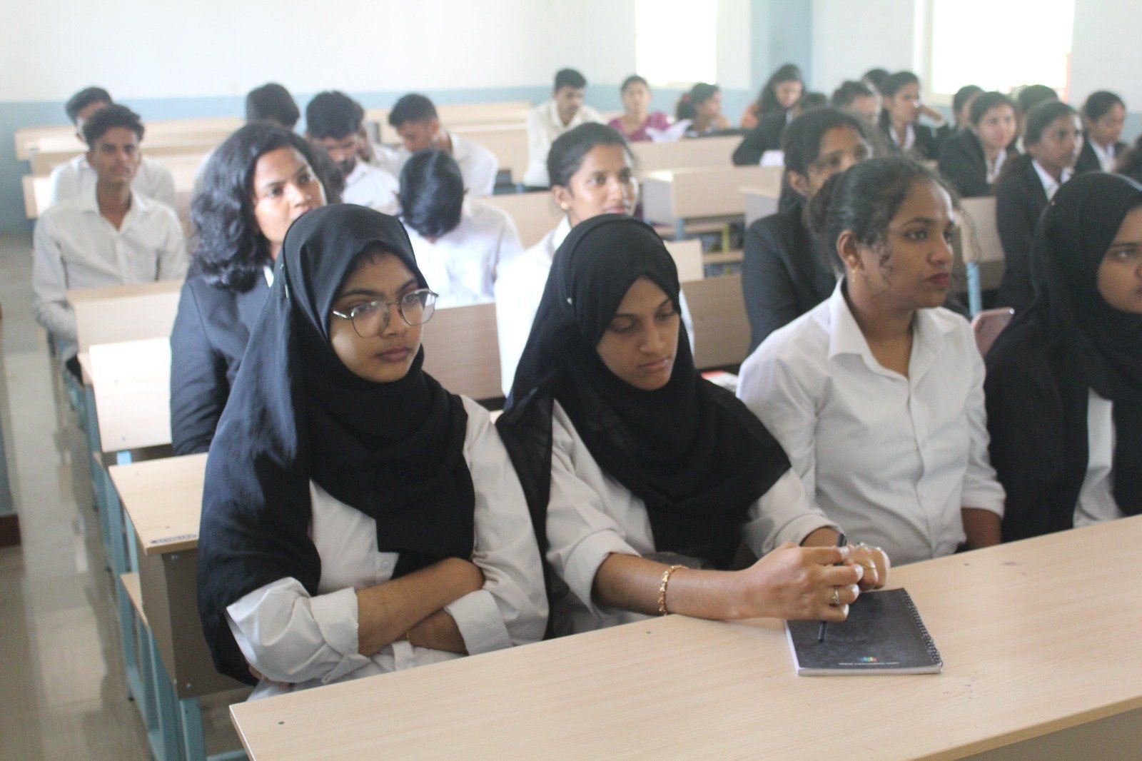 Students listening to a talk